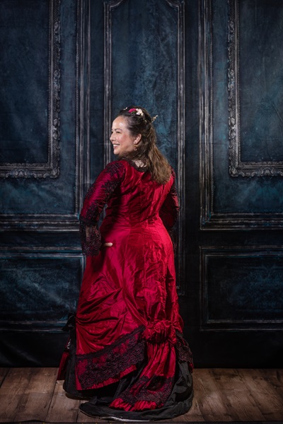 Reproduction 1878 Polonaise Natural Form Bustle - Black and Berry Silk Evening Dress. Truly Victorian TV430 and TV221. Photo by Mark Edwards.