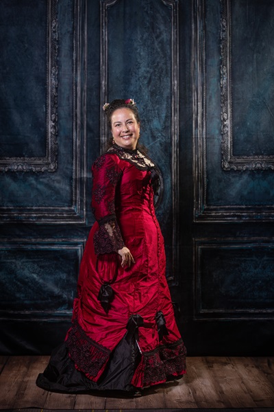 Reproduction 1878 Polonaise Natural Form Bustle - Black and Berry Silk Evening Dress. Truly Victorian TV430 and TV221. Photo by Mark Edwards.