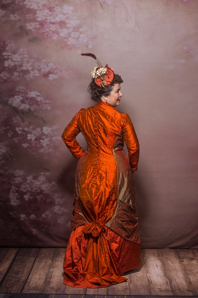 Reproduction 1878 Polonaise Natural Form Bustle - Rust Silk Day Dress. Truly Victorian TV430 and TV221. Photo by Mark Edwards.