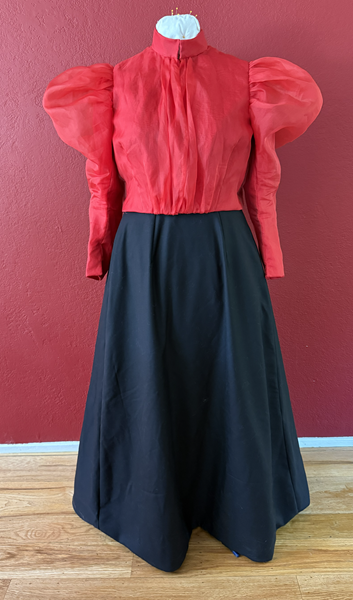Reproduction 1890s Red Blouse and Black Skirt Front. 