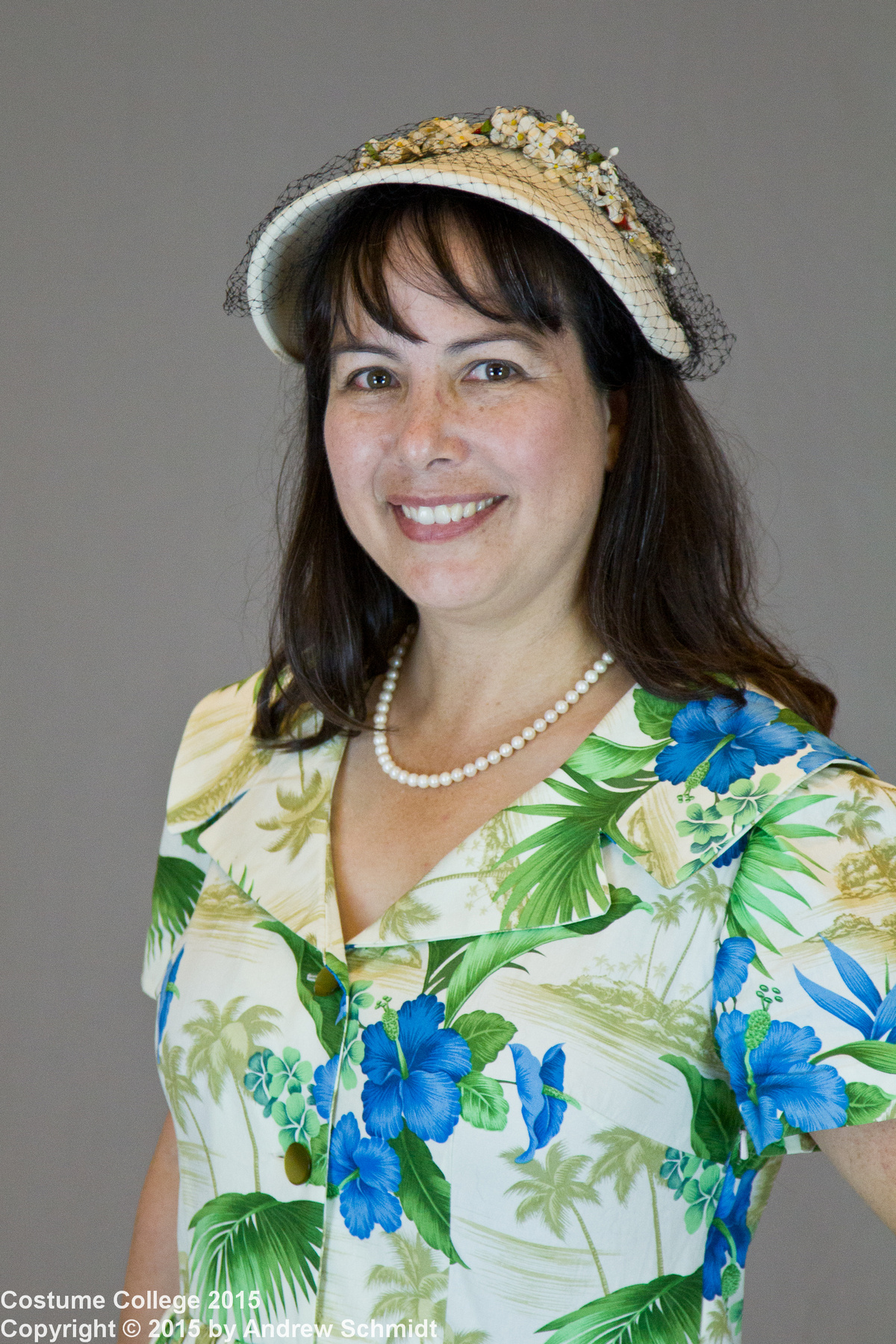 1950s reproduction retro Blue Hawaiian Dress. Portrait photo by Andrew Schmidt.