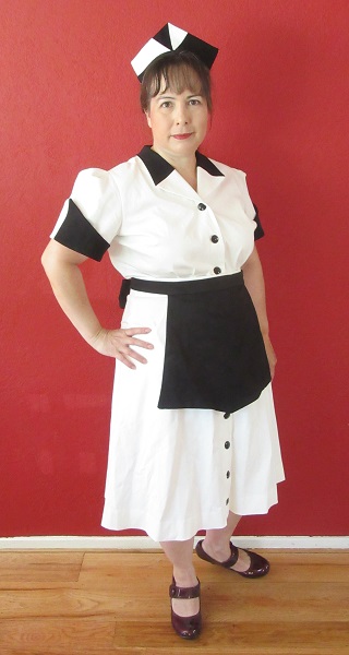 1950s Reproduction Candy Uniform Dress  Right Quarter View. 