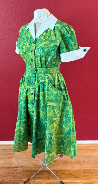 Reproduction 1950s Green Batik Dress Quarter View. Laughing Moon #134 Shirtwaist Dress