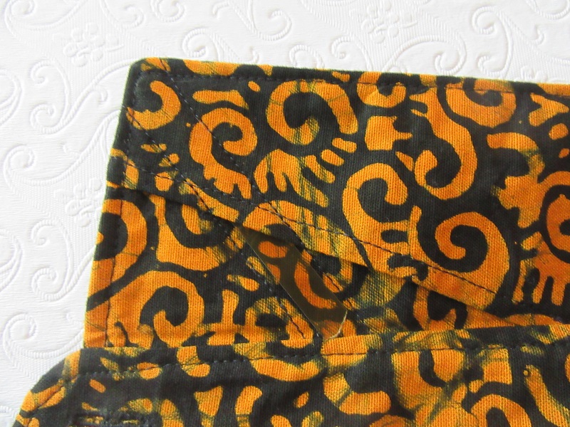 2010s Men's Orange and Black Batik Shirt Collar Stay. 