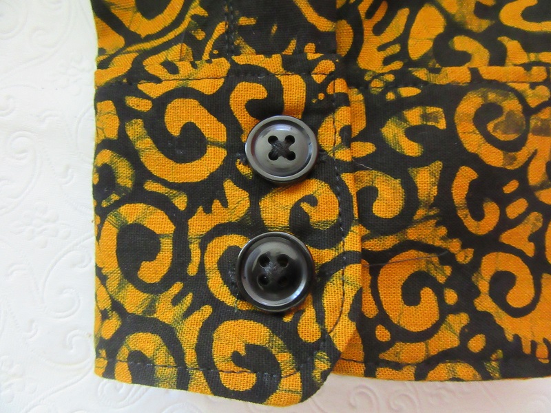 2010s Men's Orange and Black Batik Shirt Cuff